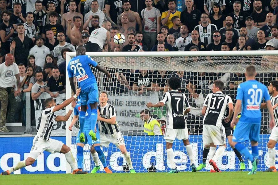 Napoli's Kalidou Koulibaly scores the only goal of the match - Reuters photo