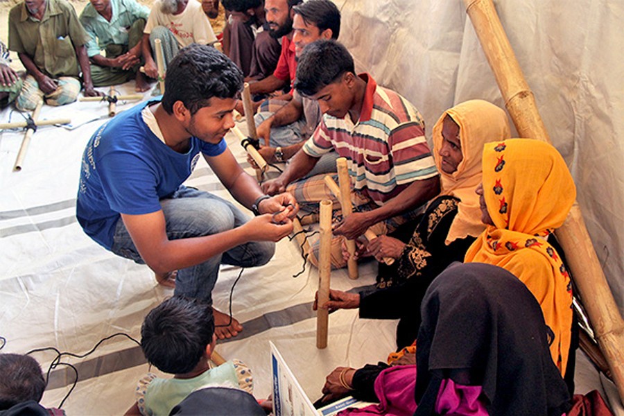 Stronger shelters will be key to surviving the monsoon and cyclone seasons in Bangladesh's refugee camps. 	— Photo: IOM