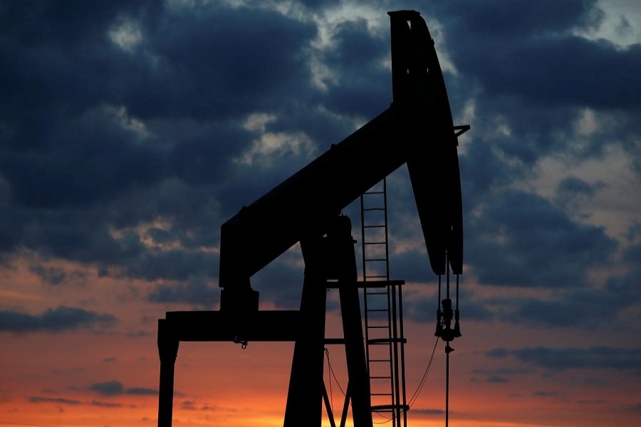 Oil pumps are seen at sunset outside Vaudoy-en-Brie, near Paris, France April 23, 2018. Reuters