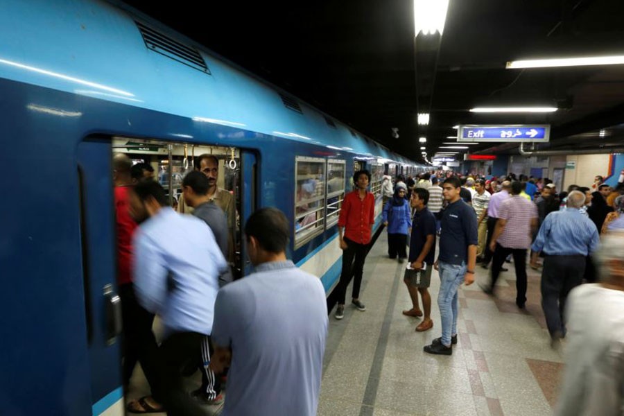 People wait to board a train at Al Shohadaa metro station in Cairo, Egypt. Reuters.