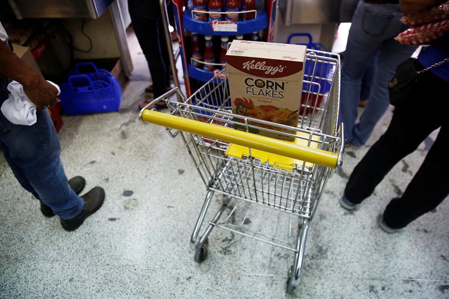 A box of corn flakes made by Kellogg is seen on a shopping cart inside a local shop in Caracas, Venezuela on Tuesday - Reuters photo