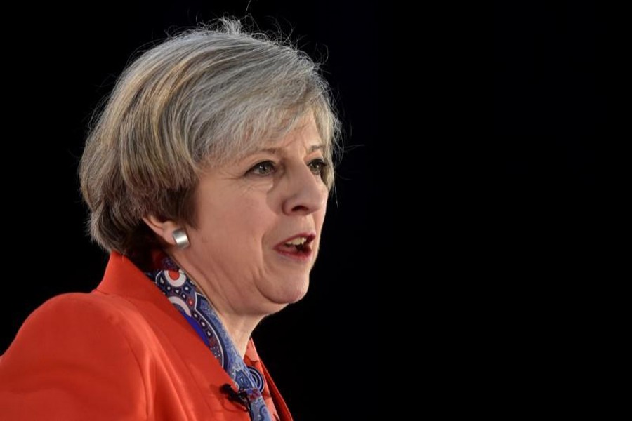 Britain's Prime Minister Theresa May speaks at the Conservative Party's Spring Forum in Cardiff, Wales, March 17, 2017. Reuters/File