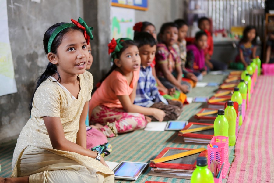 As many as 50,000 slum children across the country now receive primary education. Photo: Greenwatch Dhaka