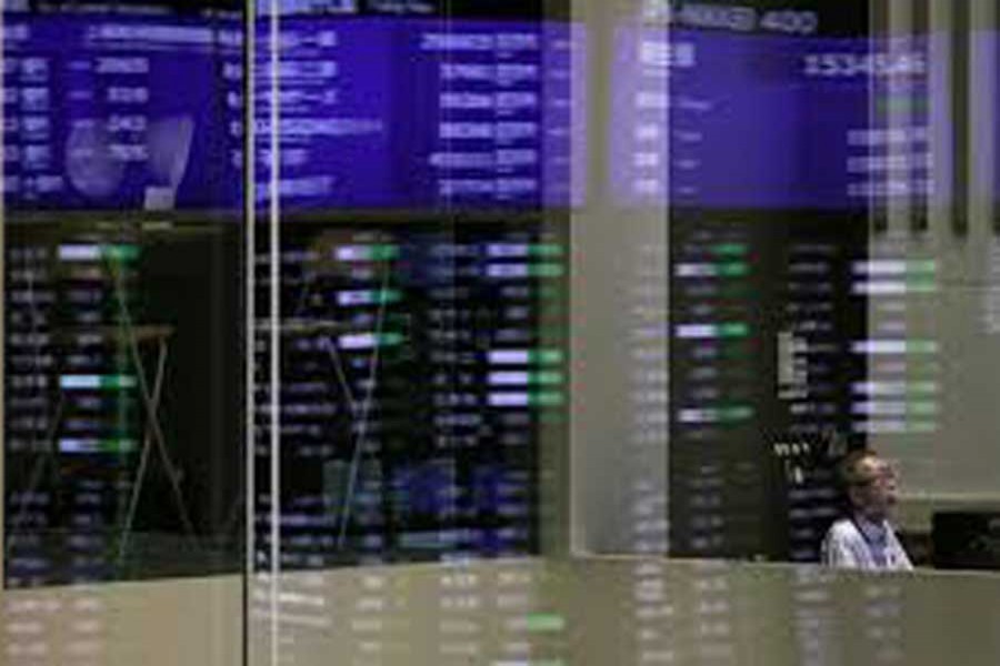 Asian shares stumble as dollar strengthens