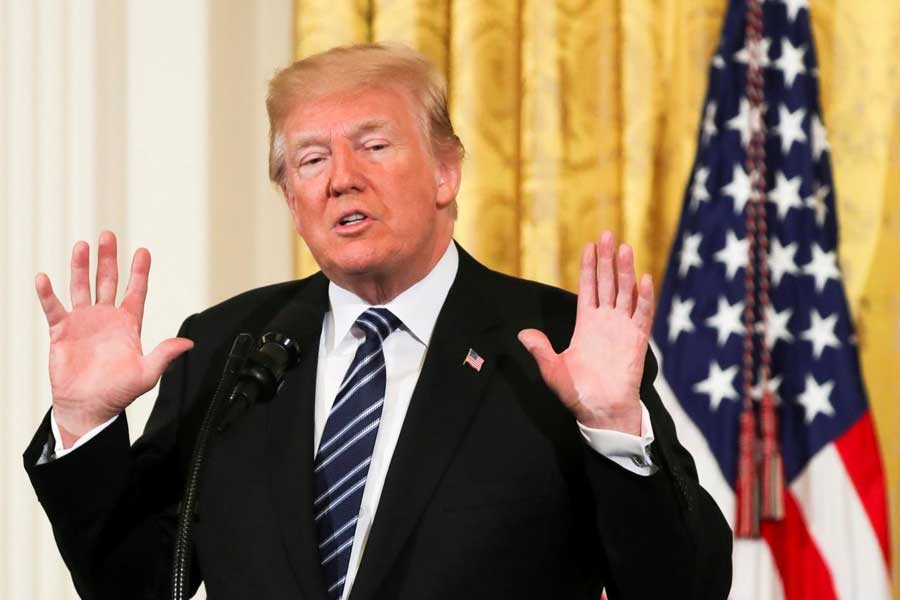 US President Donald Trump gestures as he delivers remarks during the Prison Reform Summit at the White House in Washington, US, May 18, 2018. Reuters