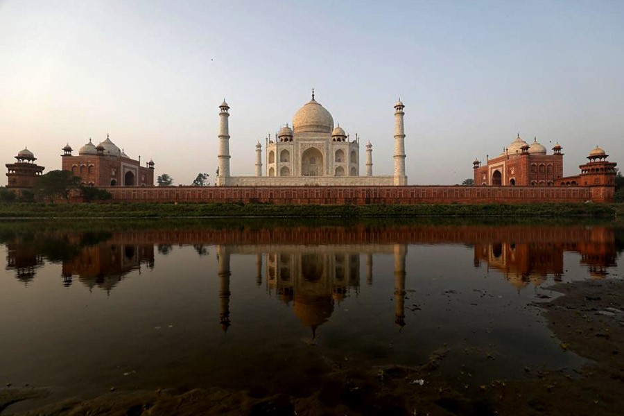 White marble Taj Mahal turning yellow, green