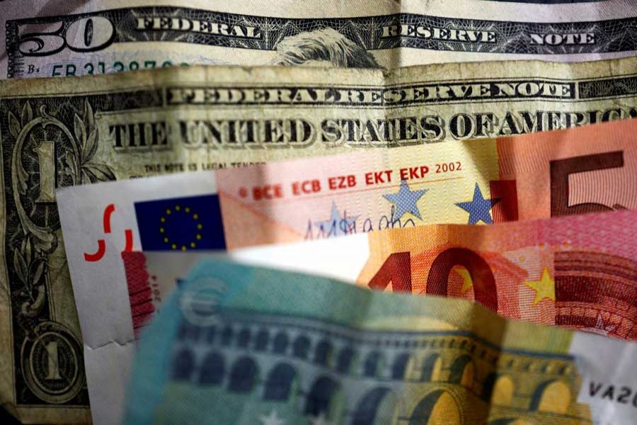 US dollar and Euro bank notes are photographed in Frankfurt, Germany, in this illustration picture taken May 7, 2017. Reuters/File Photo