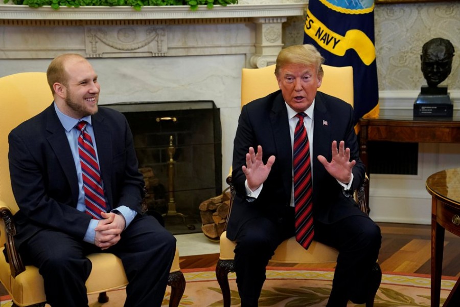 US President Donald Trump talks to the media with Josh Holt, an American missionary who was released by Venezuela, in the Oval Office of the White House in Washington. Reuters.