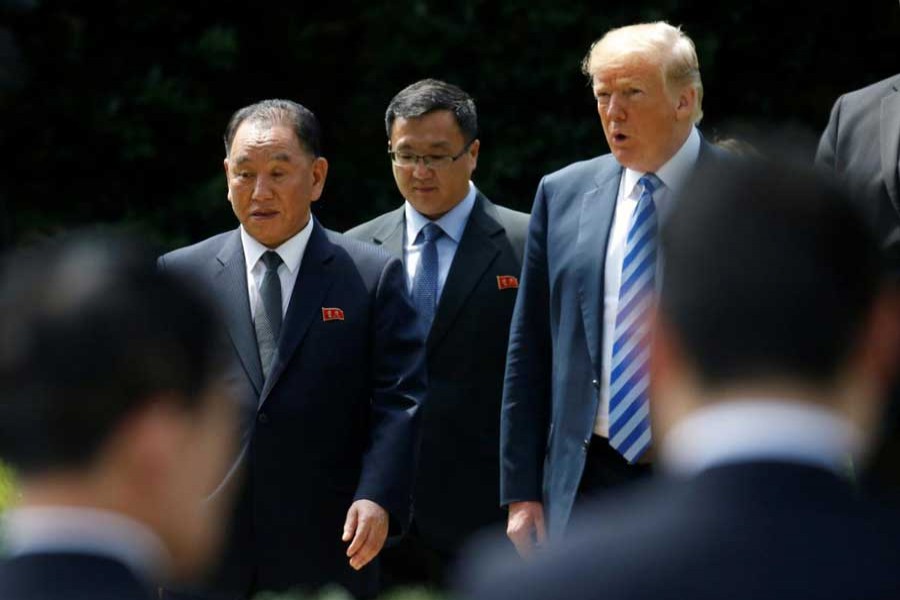 North Korean envoy Kim Yong Chol talks with US President Donald Trump as they walk out of the Oval Office after a meeting at the White House in Washington, US, June 1, 2018. Reuters