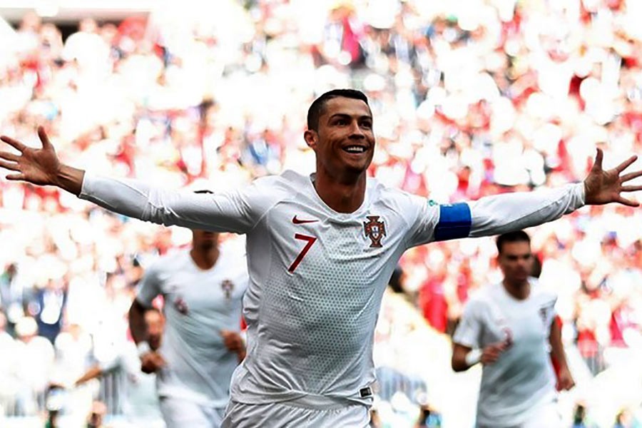 Cristiano Ronaldo celebrating their first goal against Morocco at Luzhniki Stadium in Moscow of Russia  on Wednesday. -Reuters Photo