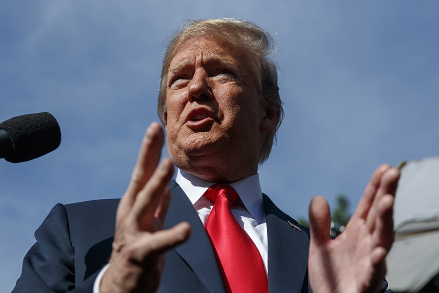 President Donald Trump speaks to reporters at the White House on Friday last - AP file photo