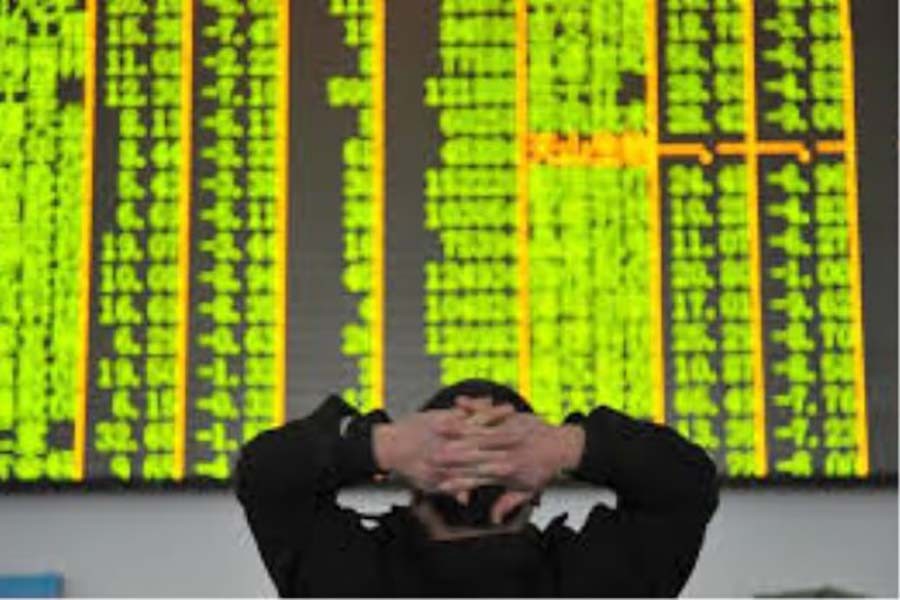 Asian shares edge down as trade war begins