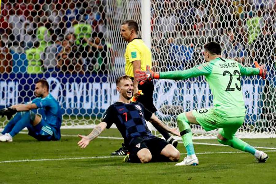 Two of Croatian heroes -- goalkeeper Danijel Subasic and playmaker Ivan Rakitic look ecstatic after a pulsating 4-3 penalty shootout win over hosts Russia to set up a World Cup semi-final against England. Rakitic scored the winner from the spot and Subasic made one save in the shootout. -Reuters photo