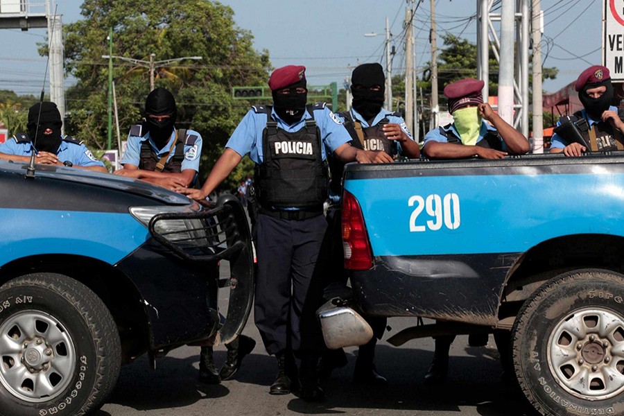 Police block the entrance of Divine Mercy Roman Catholic Church in Managua on Saturday — Reuters photo