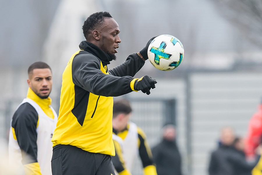 Jamaica’s former sprinter Usain Bolt, centre, takes part in a practice session of the Borussia Dortmund football squad in Dortmund, Germany on March 23 last - AP file photo