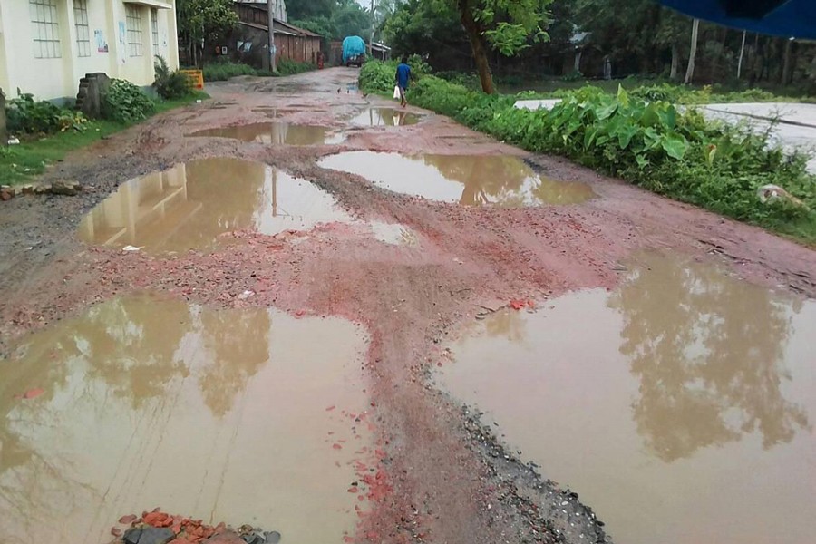 A partial view of the dilapidated Dupchanchia-Talora connecting road in Dupchanchia upazila of Bogura 	— FE Photo