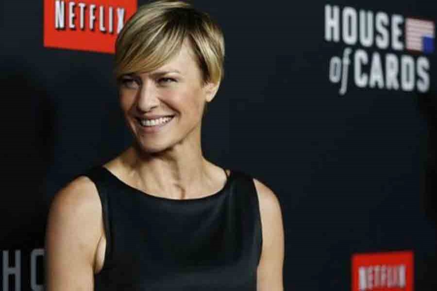 Cast member Robin Wright poses at the premiere for the second season of the television series "House of Cards" at the Directors Guild of America in Los Angeles, California February 13, 2014. Reuters/File photo