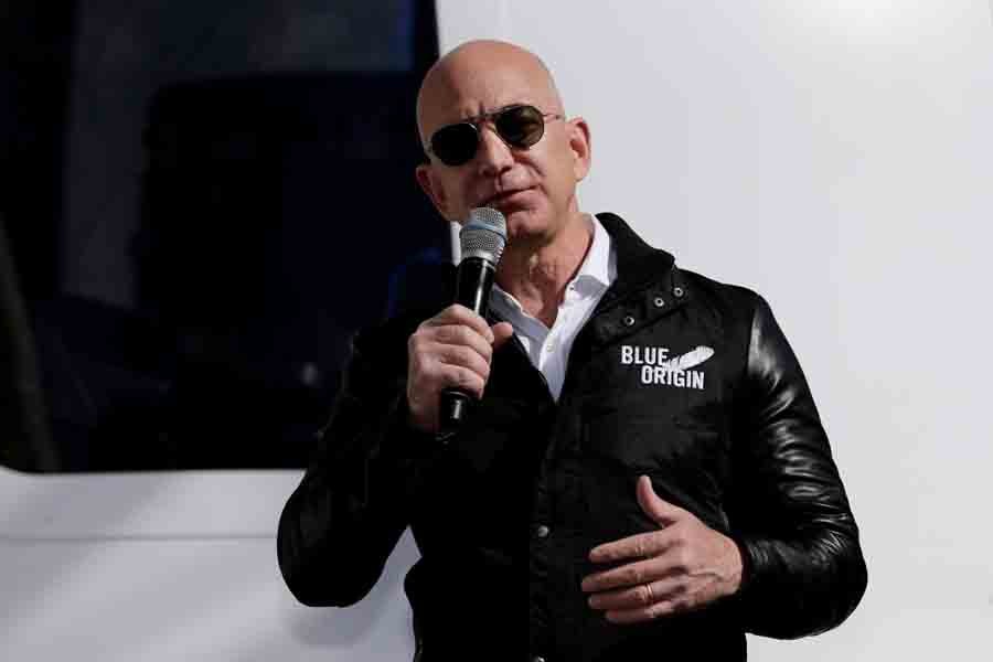 Amazon and Blue Origin founder Jeff Bezos addresses the media about the New Shepard rocket booster and Crew Capsule mockup at the 33rd Space Symposium in Colorado Springs, Colorado, US, April 5, 2017. Reuters/File photo