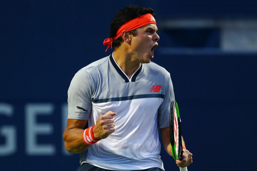 Canada's Milos Raonic celebrating after beating Belgium's David Goffin during the first round of the Men's Rogers Cup tennis tournament in Toronto on Monday 	— Internet