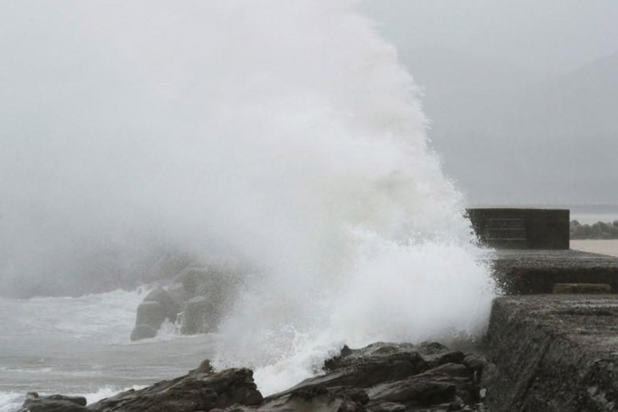 A wave, caused by Typhoon Noru, splashes the coast in Kushima, Miyazaki prefecture, Japan, August 6, 2017 in this photo taken by Kyodo – Reuters