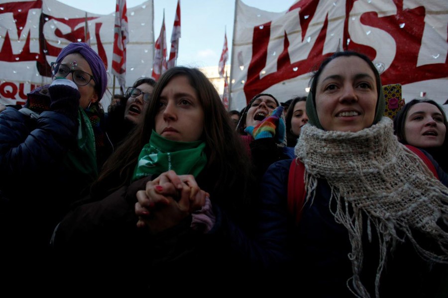 Demonstrators attend a protest in favour of legalising abortion outside the Congress while lawmakers debate an abortion bill in Buenos Aires, Argentina, June 14, 2018 – Reuters