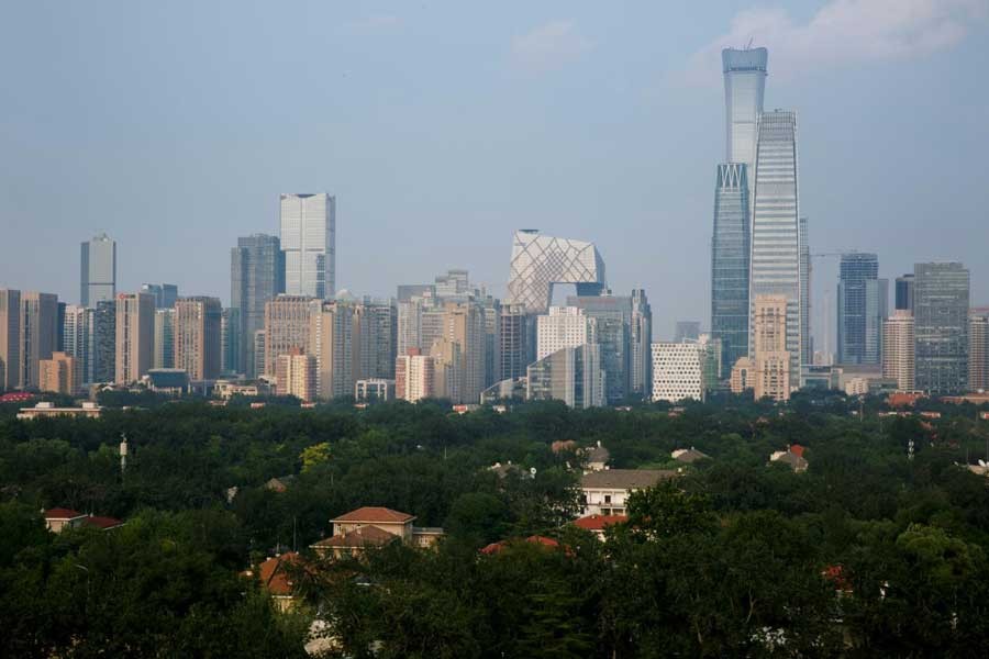 The skyscrapers of the Central Business District rise behind the capital's embassy neighbourhood in Beijing, China, July 28, 2018. Reuters/Files