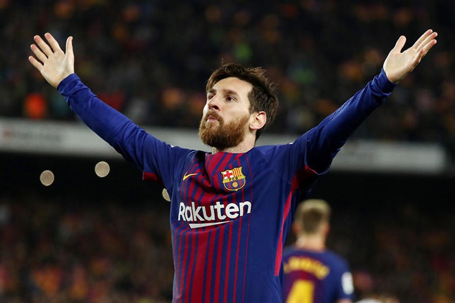 Barcelona's Lionel Messi seen celebrating his goal in this undated Reuters file photo