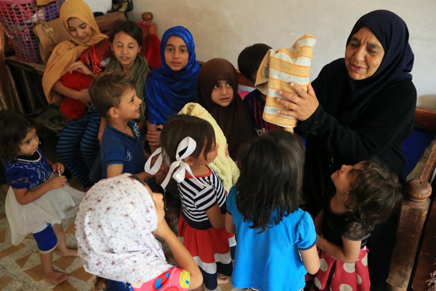 After IS killed her sons, Iraqi grandmother fends for 22 children