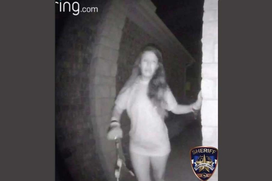 An image of a partially dressed woman, with what appear to be broken restraints dangling from her wrists, is seen in a still image from security camera video released by the Montgomery County Sheriff's Office in Montgomery County, Texas, US, on August 26, 2018 and obtained by Reuters August 28, 2018. Courtesy Montgomery County Sheriff's Office/Handout via Reuters