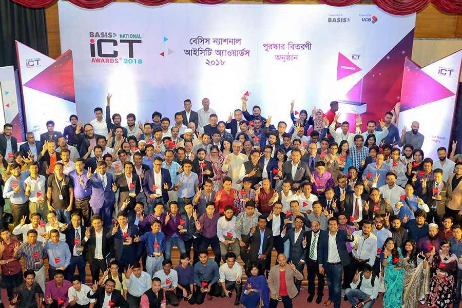 Posts, Telecommunications and ICT Minister Mustafa Jabbar with the recipients of BASIS National ICT Awards 2018 at a function in the city on Thursday — FE photo