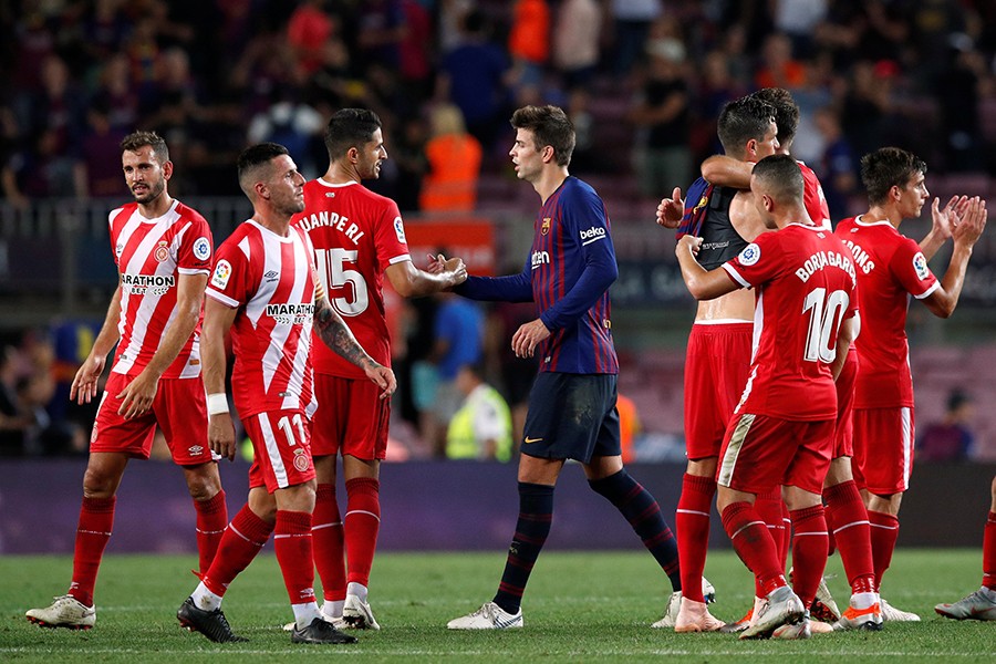 10-man Barca drop first points of season