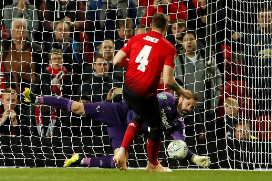 Phil Jones missed the crucial spot-kick as Derby eliminated Manchester United from the League Cup on penalties	— Reuters