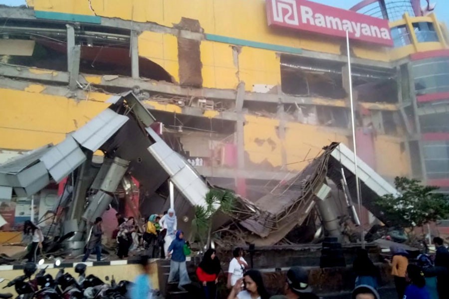 A shopping center heavily damaged following an earthquake in Palu, Central Sulawesi, Indonesia September 28, 2018 in this handout photo made available by Antara Foto - Antara Foto/BNBP/ via Reuters