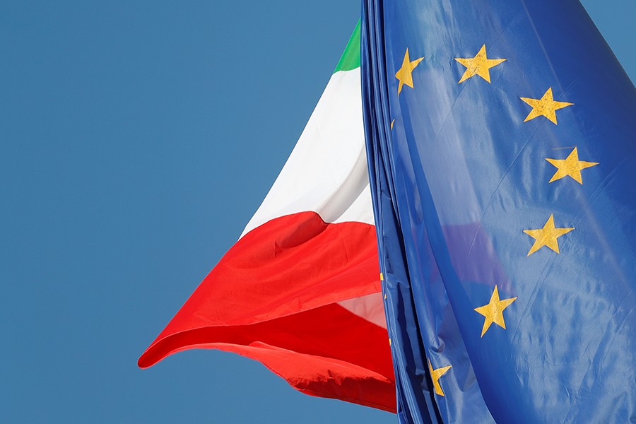 European Union and Italian flags are seen in downtown Rome, Italy on October 19, 2018 — Reuters