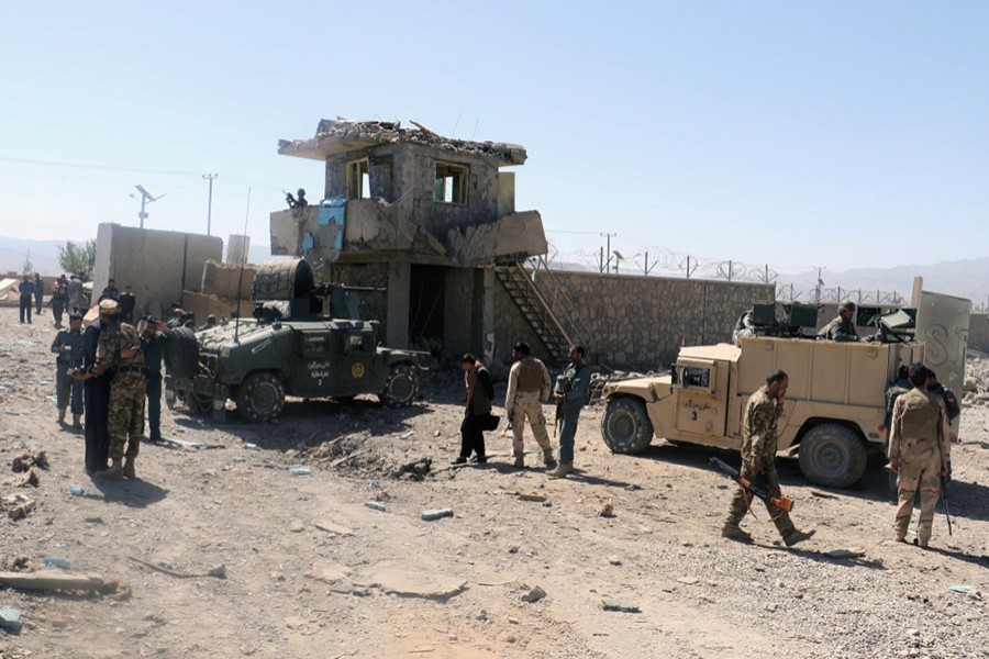 Afghan security forces inspect the aftermath of a suicide bomb blast in Paktia Province, Afghanistan - Reuters file photo