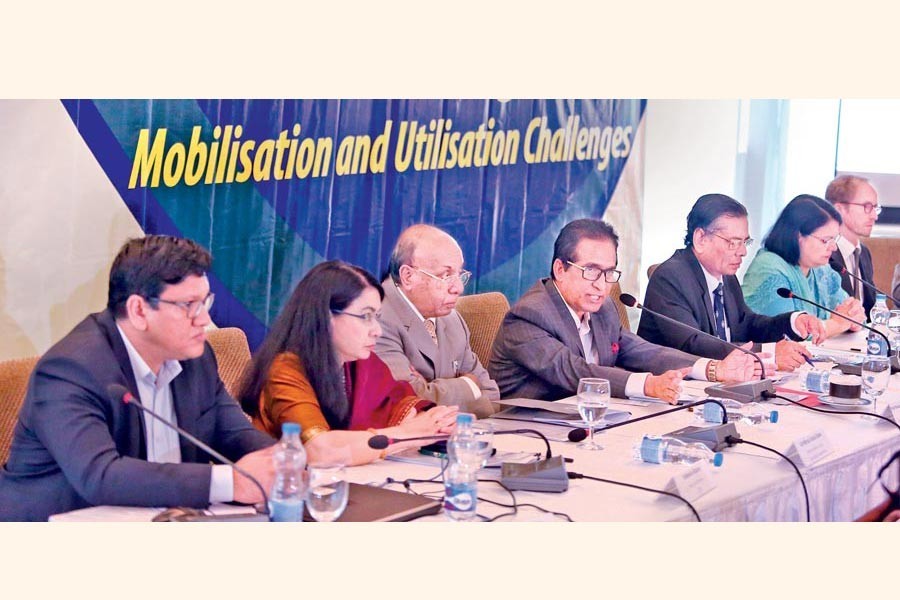 NBR chairman Mosharraf Hossain Bhuiyan addressing a dialogue organised by CPD at a city hotel on Thursday — FE photo