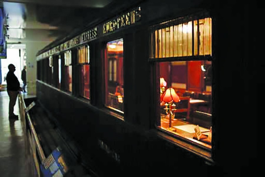 In this October  19, 2018 photo, a visitor stands by the train carriage in which the armistice of the Nov. 11, 1918 was signed, in the forest of Compiegne, north of Paris. The French and German leaders this weekend will jointly visit the preserved train carriage where the armistice ending World War I was signed on Nov. 11, 1918. For the French, the dining car became a shrine to peace. For Adolf Hitler, it was a symbol of the humiliation of surrender. The Nazi leader had it dragged to Germany after conquering France in World War II - AP