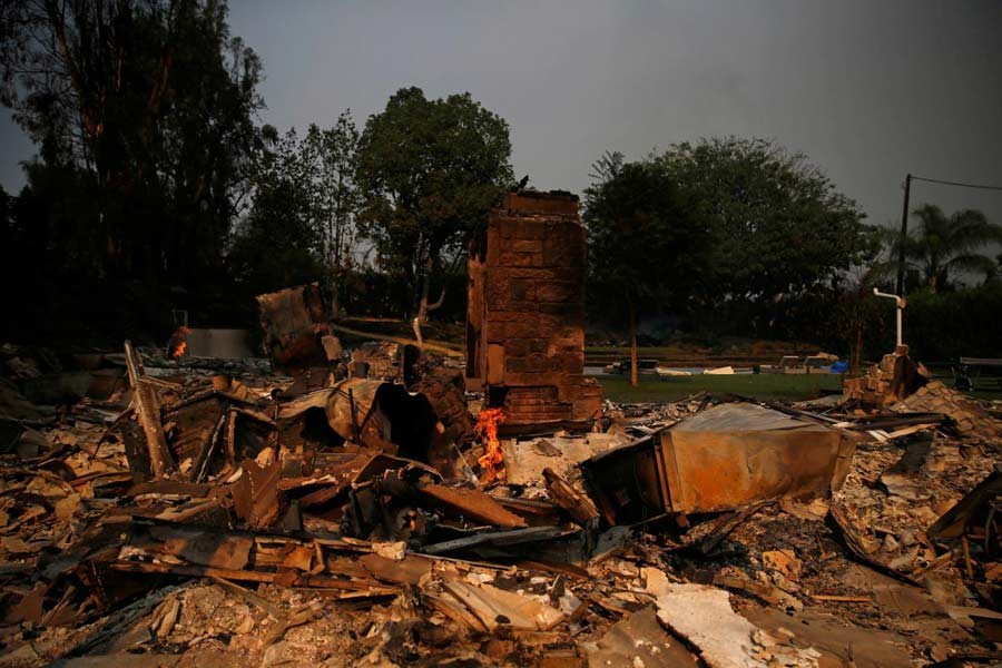 A destroyed home is seen as the Woolsey Fire continues to burn in Malibu, California, US, November 10, 2018. Reuters/Eric Thayer