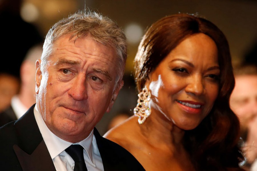 Cast member Robert De Niro and his wife Grace Hightower pose on the red carpet as they arrive for the screening of the film "Hands of Stone" out of competition at the 69th Cannes Film Festival in Cannes, France, May 16, 2016. Reuters/File