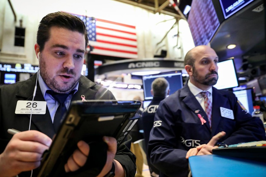 Traders work on the floor at the New York Stock Exchange (NYSE) in New York, US on November 20, 2018 — Reuters photo