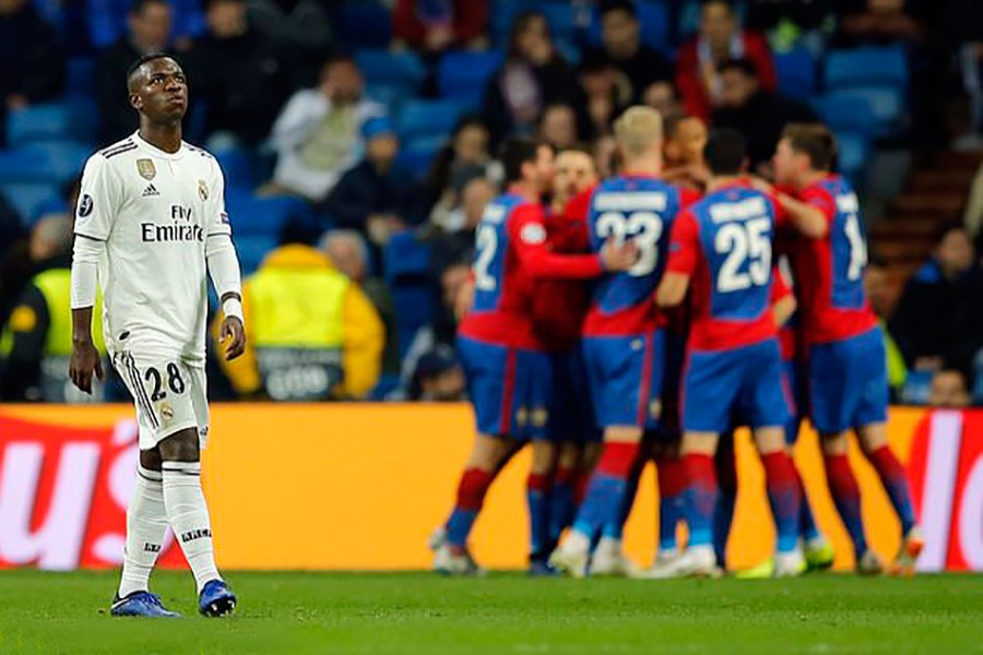 Real forward Vinicius Junior cuts a dejected figure as CSKA players celebrate in background their side's third goal, during the Champions League, Group G match at the Santiago Bernabeu stadium in Madrid, Spain on Wednesday — AP photo