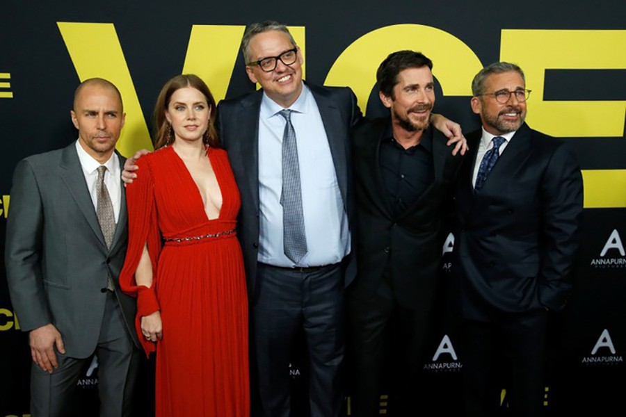 Director Adam McKay (C) and cast members (L-R) Sam Rockwell, Amy Adams, Christian Bale and Steve Carell pose at the premiere for the movie. Reuters/File