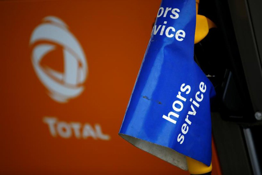 Court fines French oil group Total in Iran bribery case
