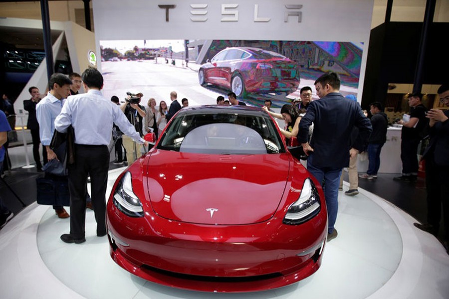 Tesla names close Musk friend Larry Ellison to board