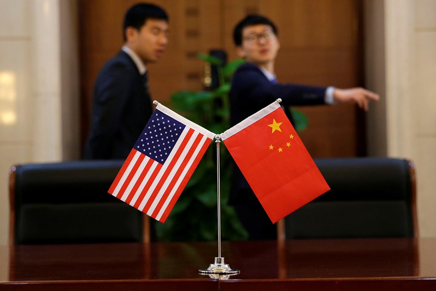 US, China begin talks to seek way out of trade war