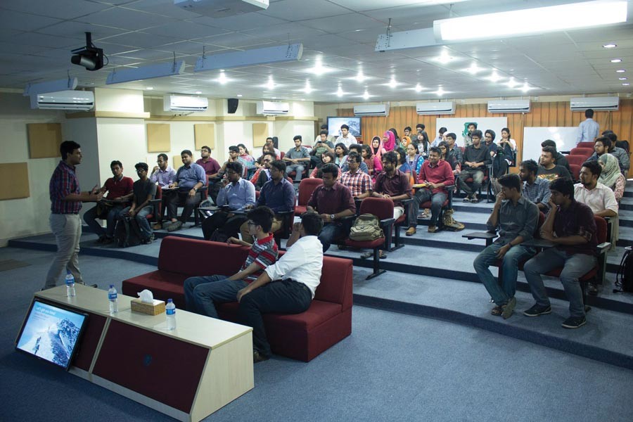 Jawaad Bin Hamid, left, conducting a session on professional  development during roadshow in a university	— File photo