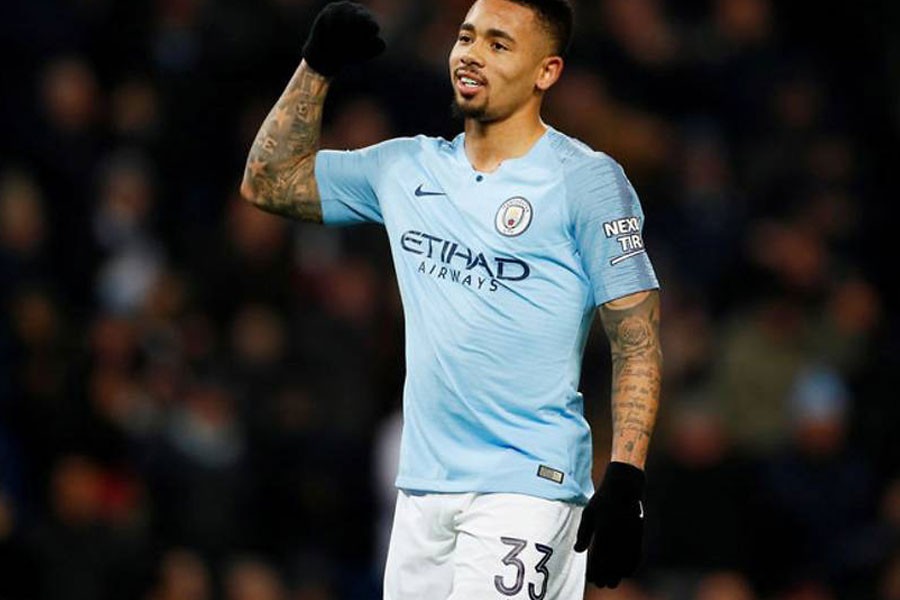 Soccer Football - Carabao Cup Semi Final First Leg - Manchester City v Burton Albion - Etihad Stadium, Manchester, Britain - January 9, 2019 Manchester City's Gabriel Jesus celebrates scoring their fifth goal to complete his hat-trick Action Images via Reuters/Jason Cairnduff