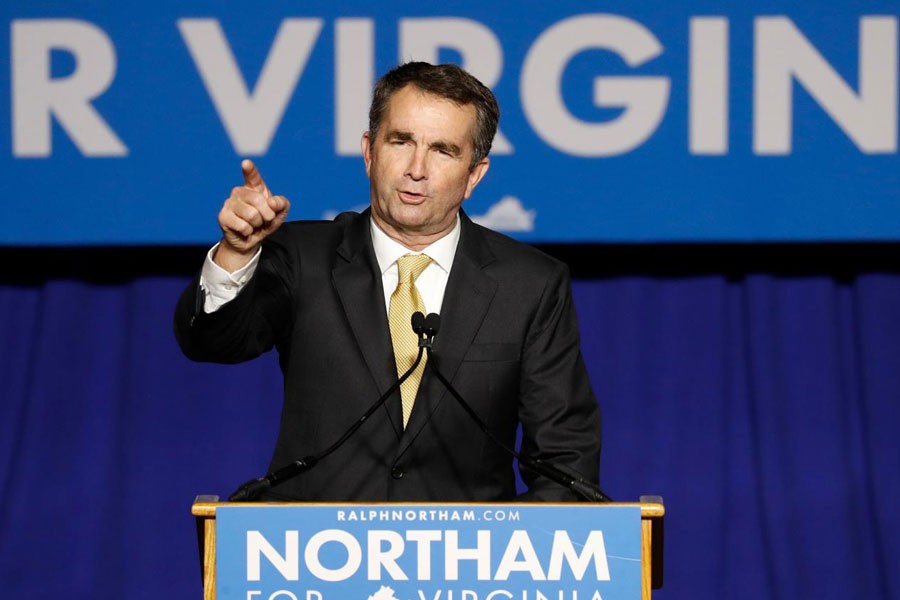 FILE PHOTO: Democratic candidate for governor Ralph Northam speaks after his election night victory at the campus of George Mason University in Fairfax, Virginia, November 7, 2017 - REUTERS/Aaron P Bernstein