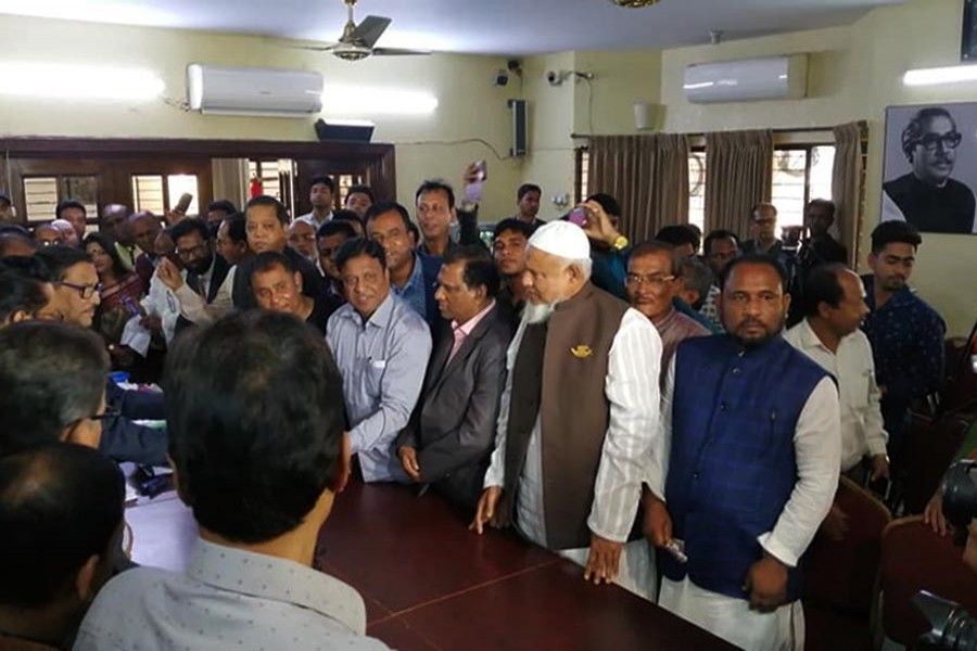 Asadul Haque, an aspirant from Kendua Upazilla of Netrokona district, purchasing the nomination paper for the chairman post (Photo: AL Facebook page)