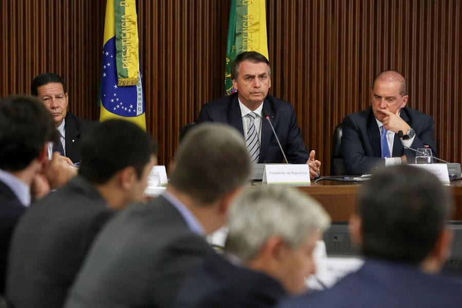 Brazilian President Jair Bolsonaro (left) attends a ministerial meeting at Planalto Palace in Brasilia — Reuters/File